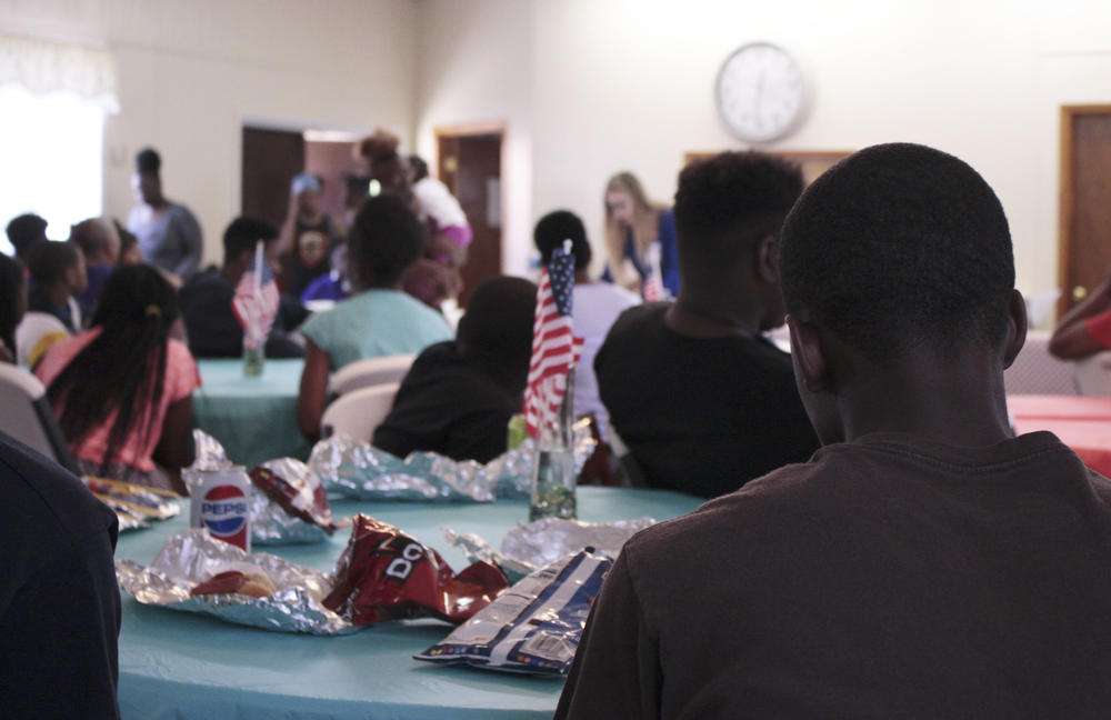 16-year old Otiserion French listens to a presentation at a community youth summit about sex ed, bullying and suicide.
