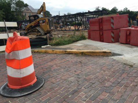 Old brick pavers speak to the historic significance of this section of Chestnut Street near the College Street bridge under construction.