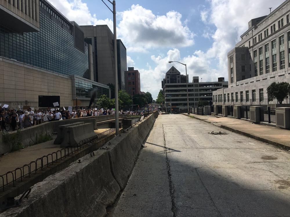 Thousands of people pack the streets of downtown Atlanta Saturday for the Families Belong Together march.