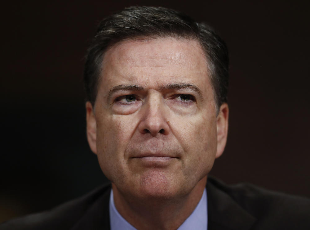 In this May 3, 2017, photo, then-FBI Director James Comey pauses as he testifies on Capitol Hill in Washington, before a Senate Judiciary Committee hearing. 