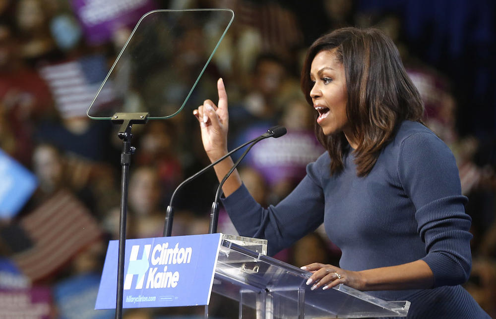 First lady Michelle Obama speaks during a campaign rally for Democratic presidential candidate Hillary Clinton Thursday, Oct. 13, 2016, in Manchester, NH.