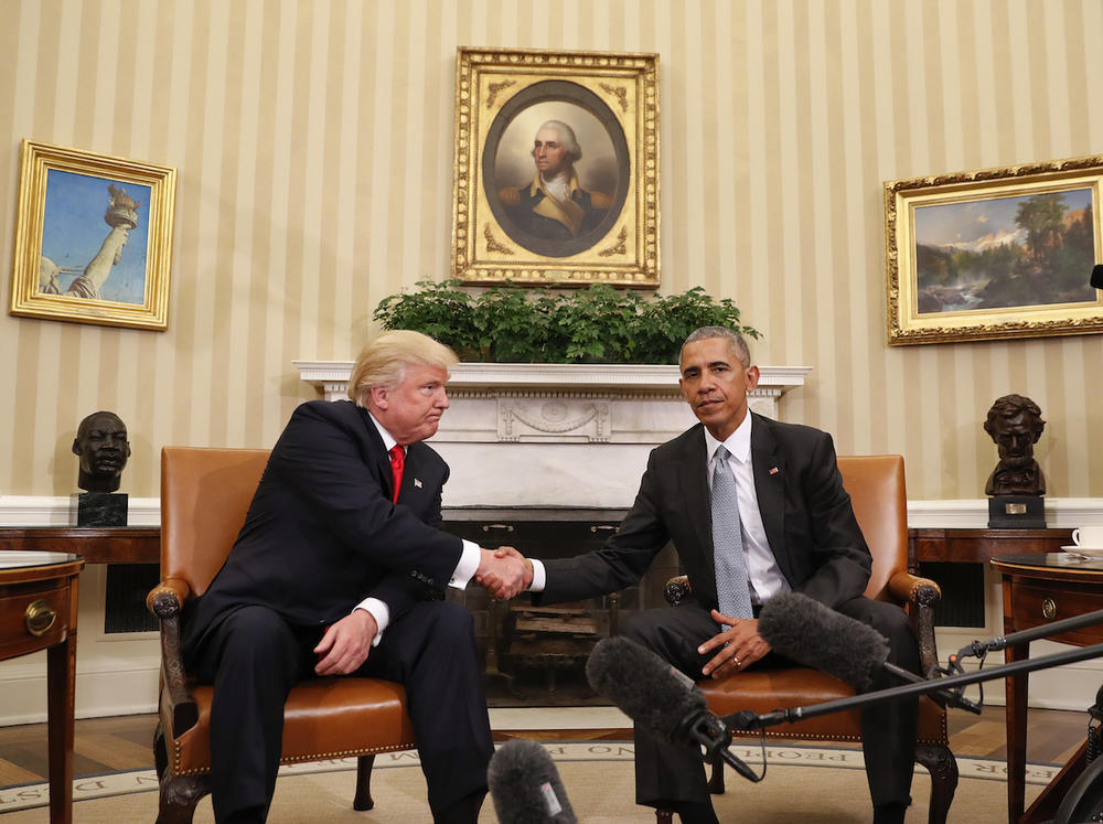 President Barack Obama and President-elect Donald Trump shake hands following their meeting in the Oval Office of the White House in Washington, Thursday, Nov. 10, 2016.