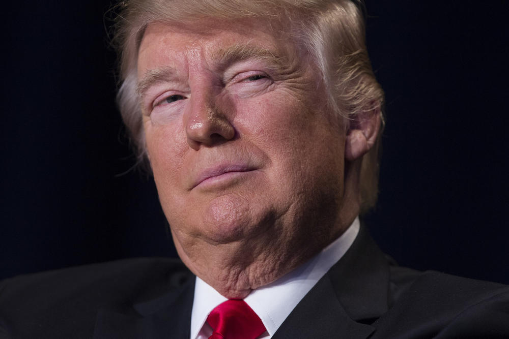 President Donald Trump listens as he is introduced during the National Prayer Breakfast, Thursday, Feb. 2, 2017, in Washington. 