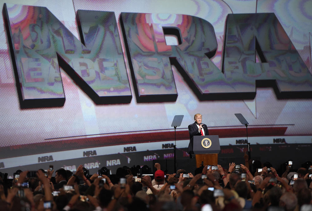 President Donald Trump speaks at the National Rifle Association-ILA Leadership Forum, Friday, April 28, 2017, in Atlanta. The NRA is holding its 146th annual meetings and exhibits forum at the Georgia World Congress Center.