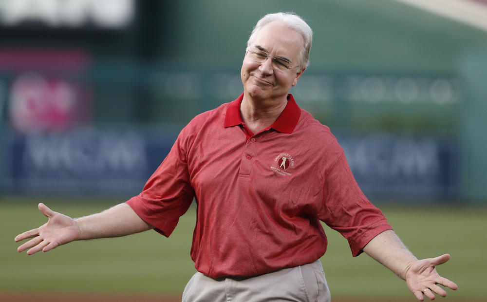 Secretary of Health and Human Services Tom Price reacts after throwing out the ceremonial first pitch before the start of a baseball game between the Washington Nationals and the Miami Marlins, Wednesday, Aug. 9, 2017, in Washington. 