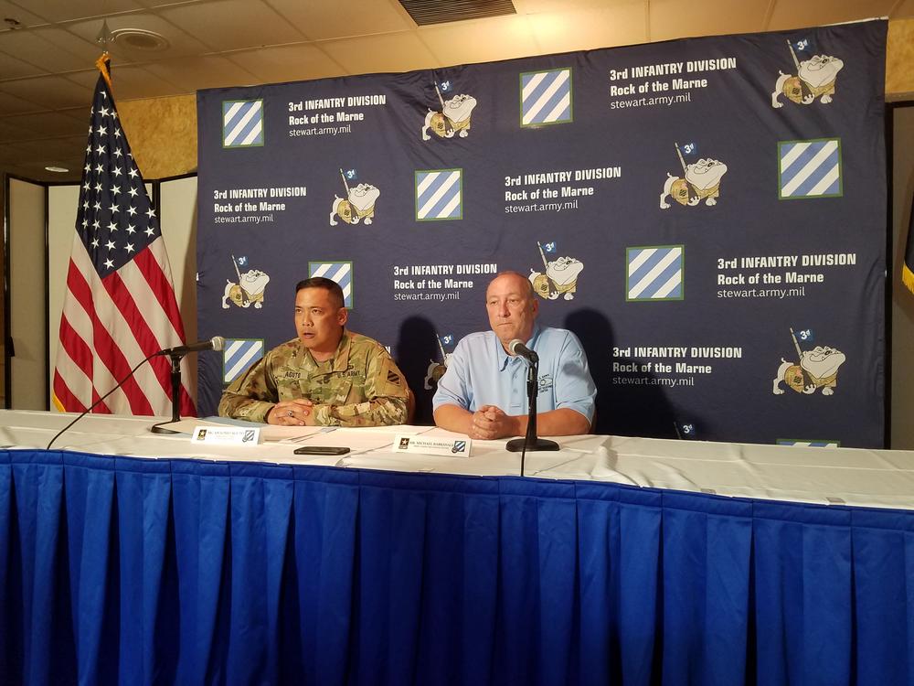 Maj. Gen. Antonio Aguto (left), commanding general of the Third Infantry Division, and Michael Barksdale of the Army Combat Readiness Center deliver a briefing on the training deaths of three soldiers at Fort Stewart.