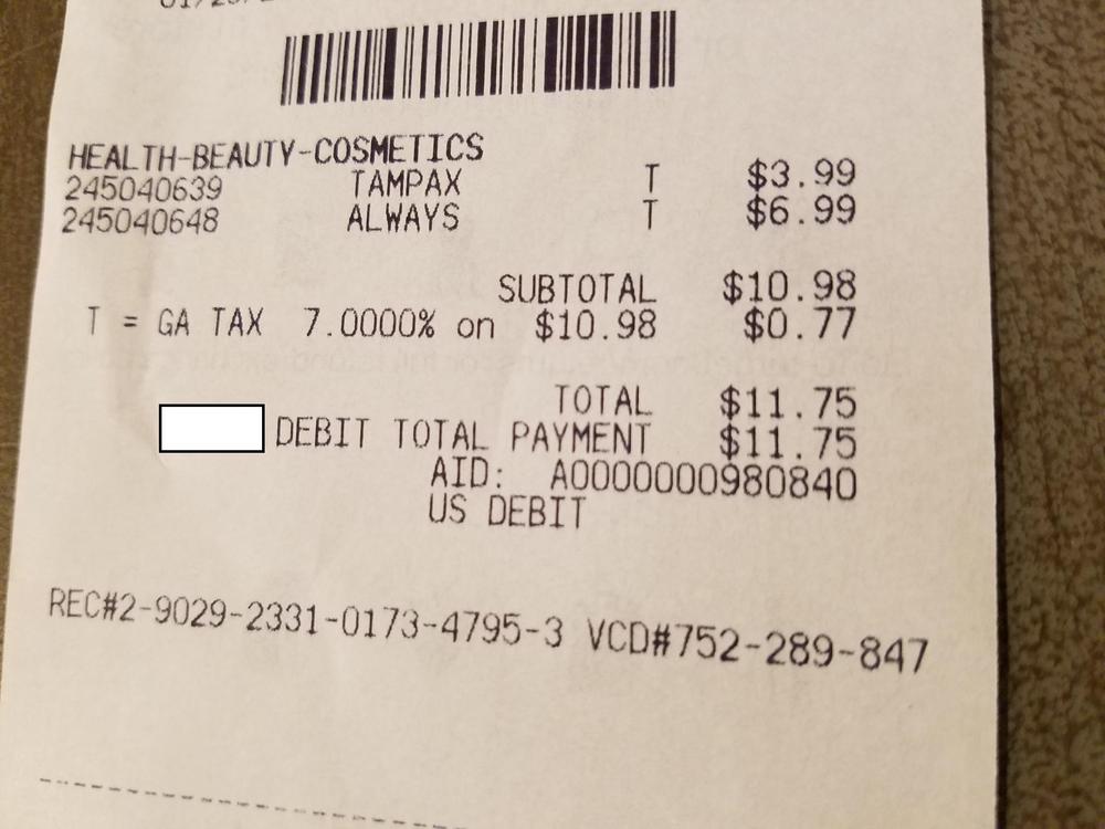 A receipt for tampons and menstrual pads shows the state and local sales tax on those items.