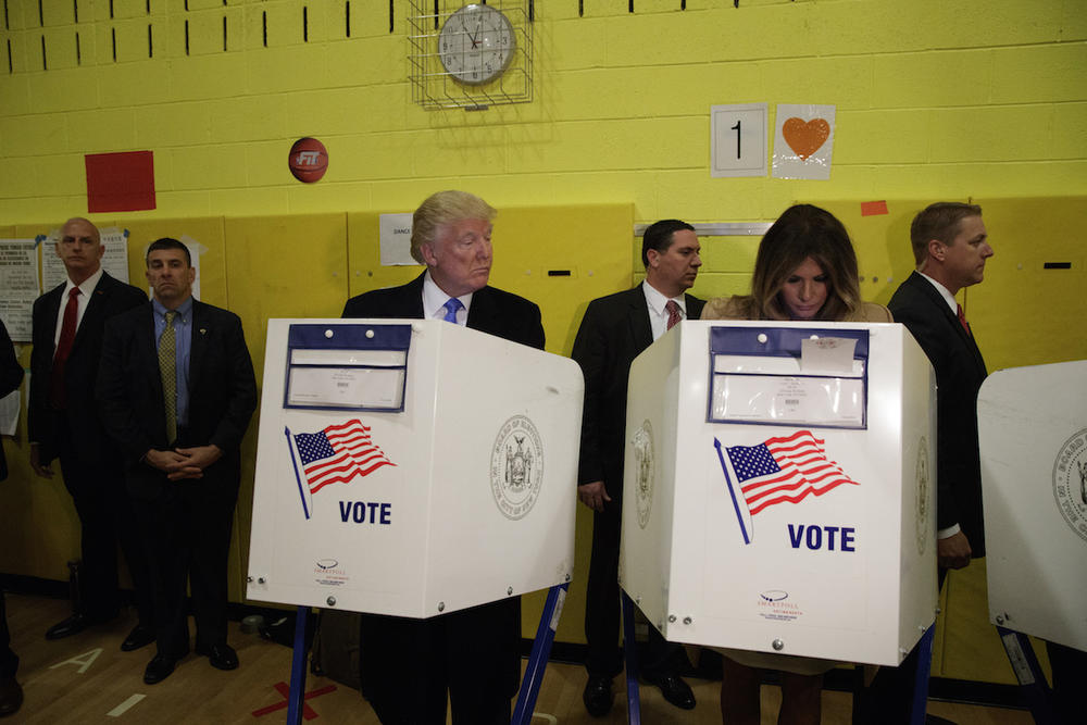 Republican presidential candidate Donald Trump looks at his wife Melania as they cast their votes at PS-59, Tuesday, Nov. 8, 2016, in New York.