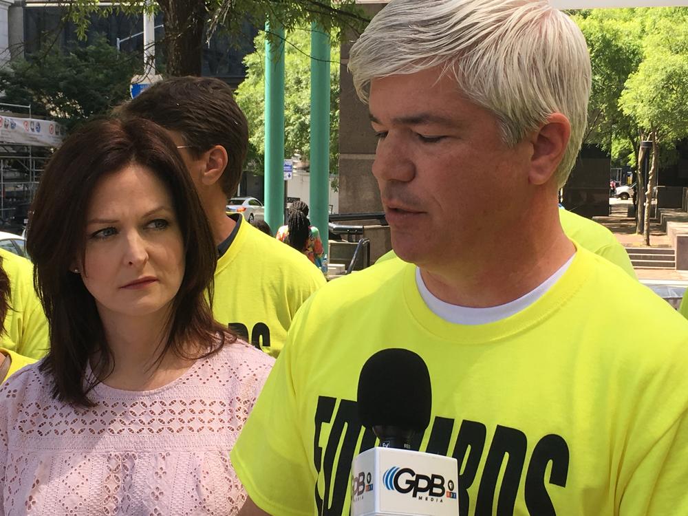 Robyn Rowles (left) and William Perry at a news conference Thursday.