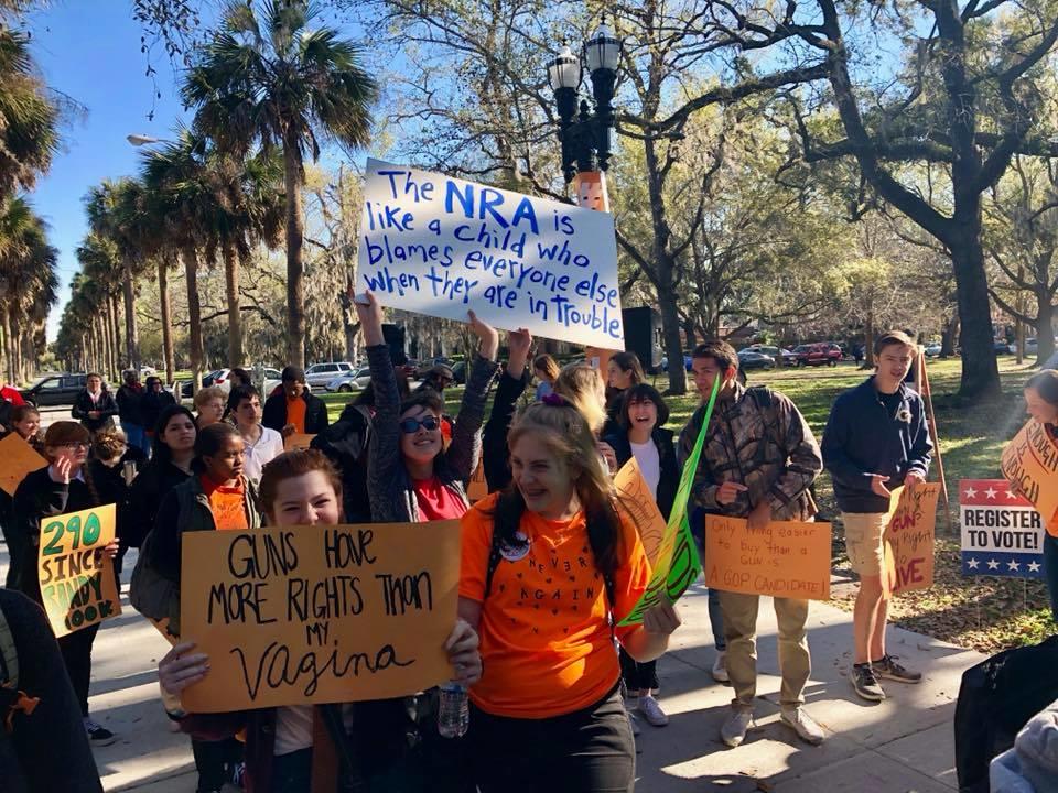 Students march down the streets in Savannah in protest of gun violence