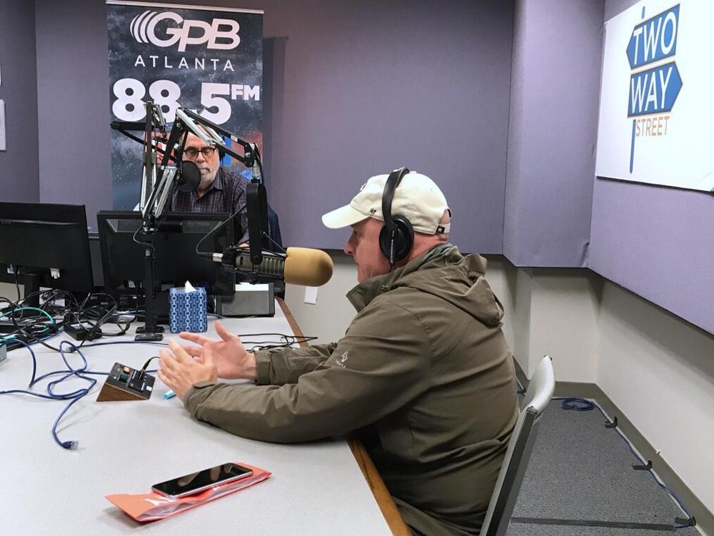 Scott Kelly in the GPB studio with his The Varsity crown (left corner).