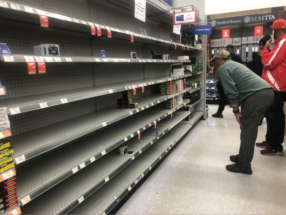 Customers combing through the leftover ammo at Sports Academy in Newnan, Georgia.