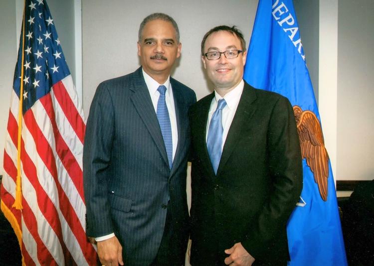 Bryan Sells with Attorney General Eric Holder at the U.S. Department of Justice in 2013.