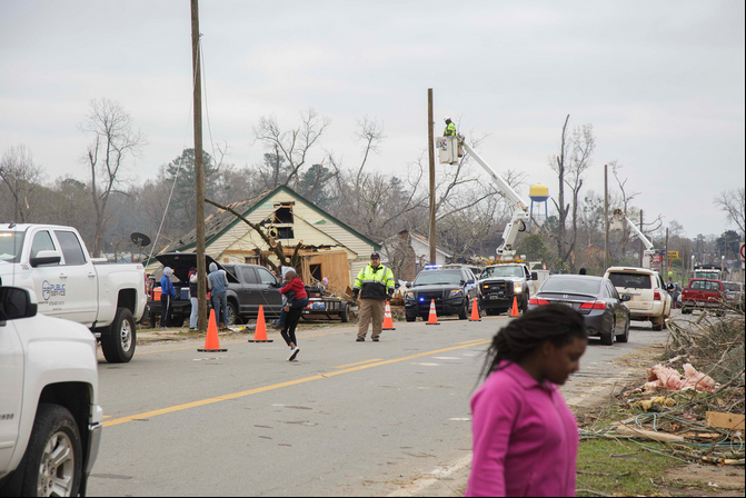 The view down one of two main roads leading into Talbotton that were heavily damaged by a tornado Sunday.