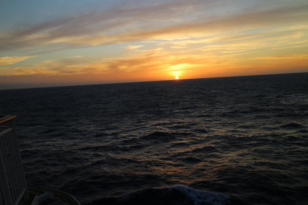 The sun sets on the Gulf of Mexico as the Norwegian Dawn makes its way back to the United States full of passengers.