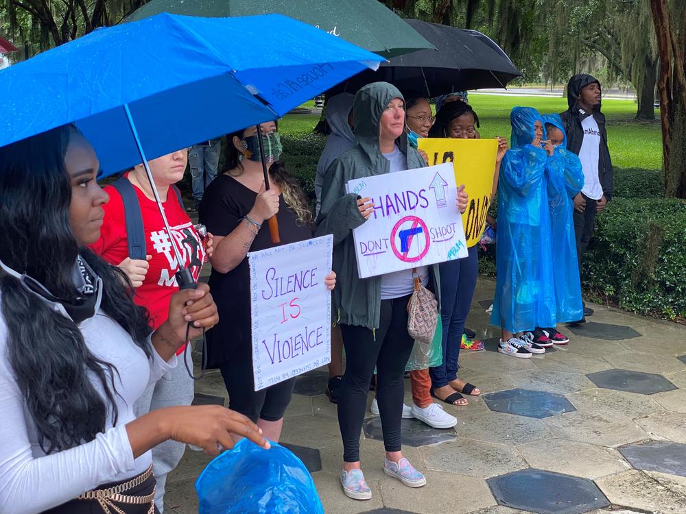 Supporters chanted "I run with Maud" outside the Glynn County courthouse June 4.
