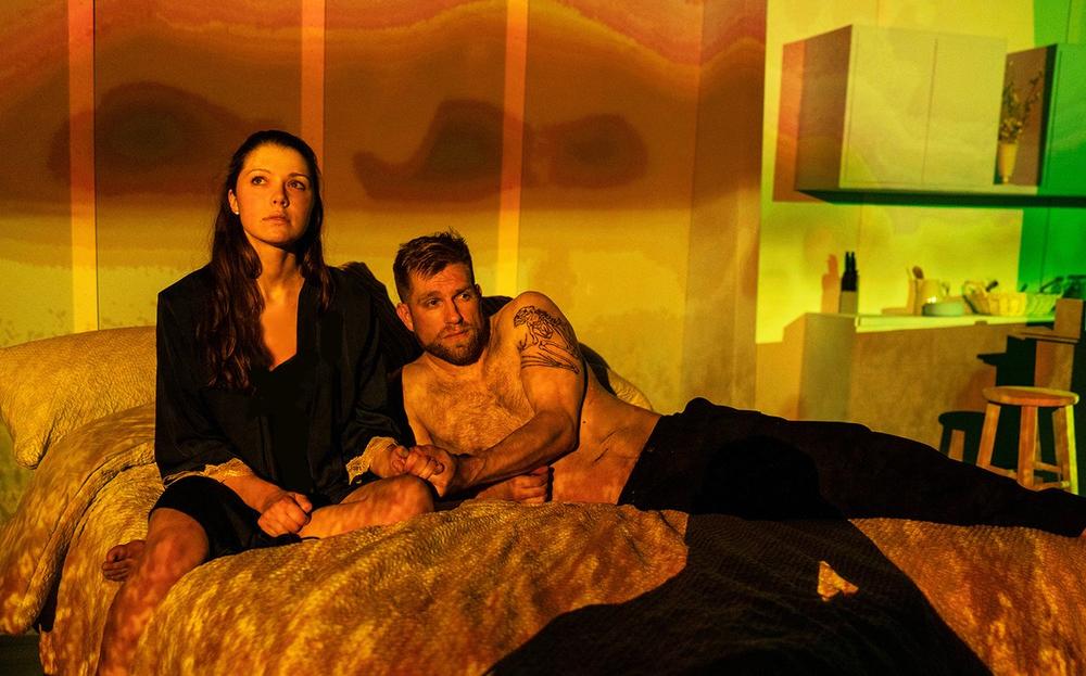Actors Rebeca Robles and Joe Sykes photographed on set for "The Hero's Wife." 