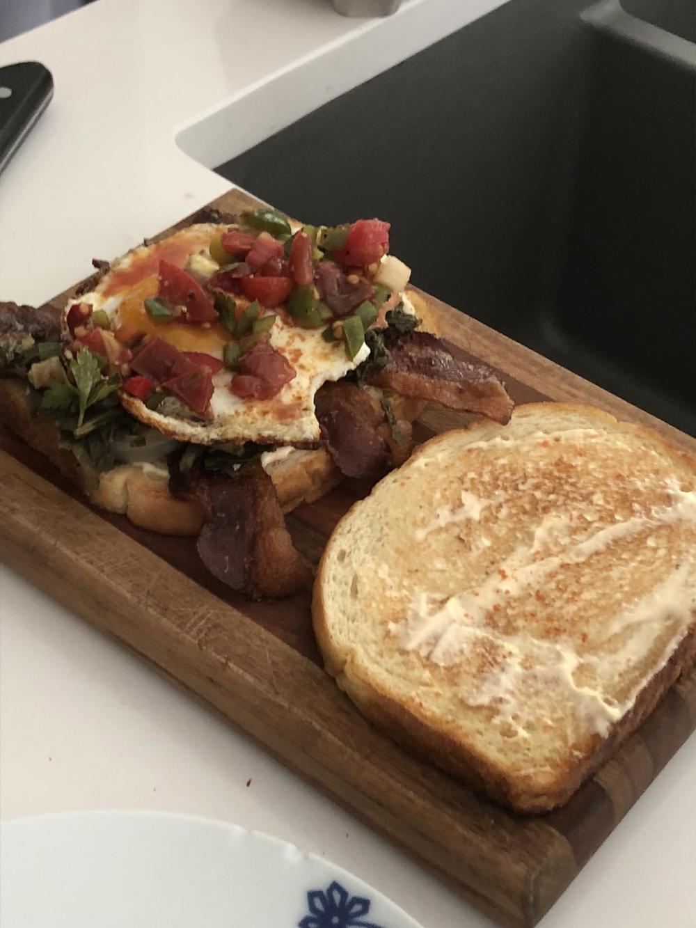 Todd Richards' bacon, collard, and fried egg sandwich.