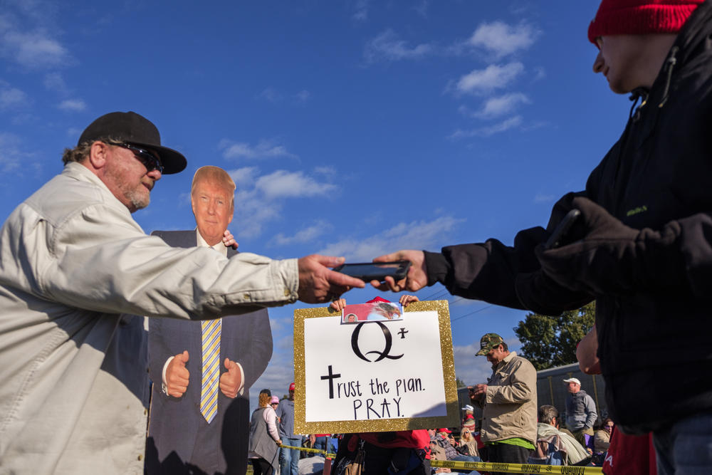 A paper cutout Trump was a big attraction in the line outside the airport hangar in Macon where Trump later spoke. 