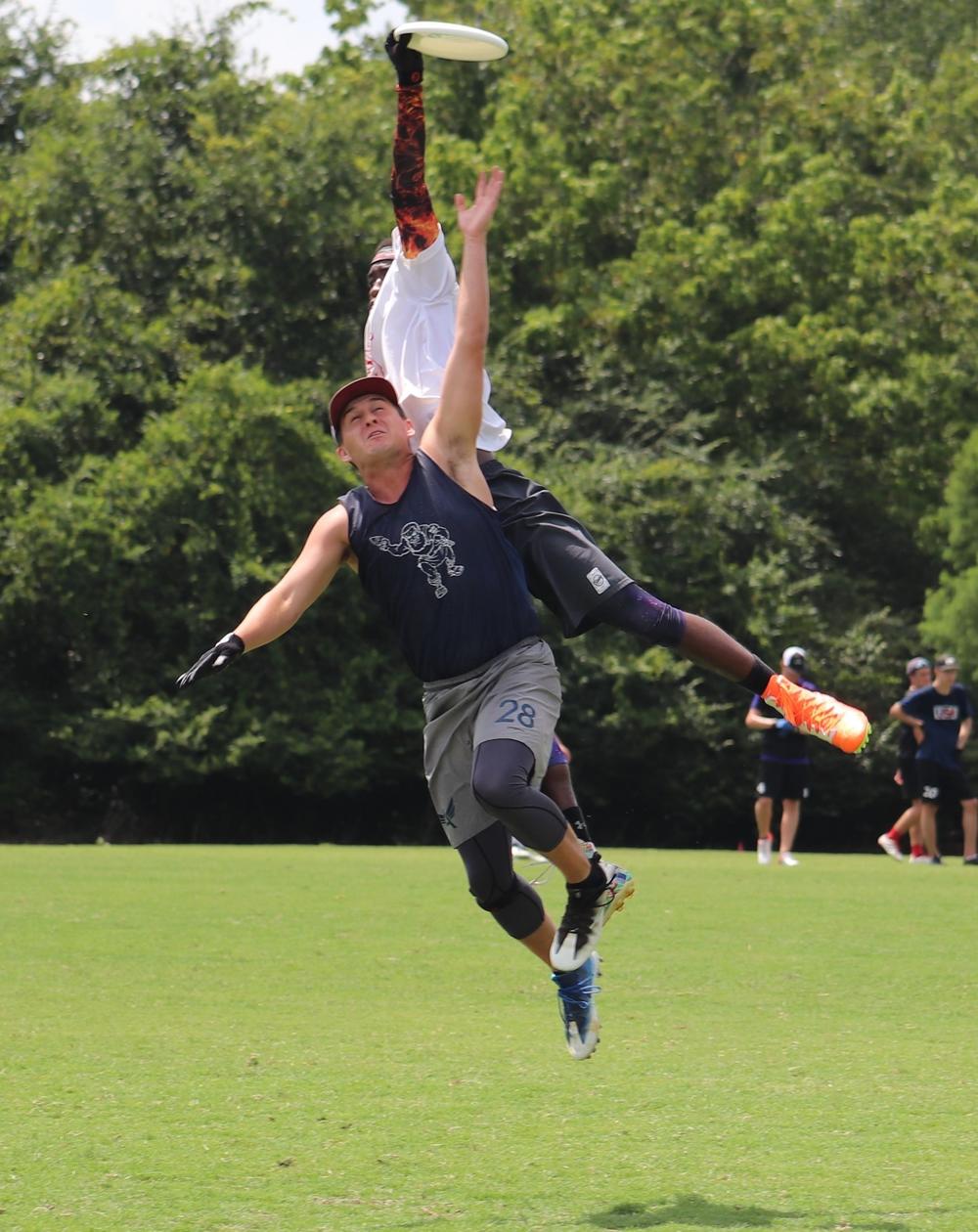 Kendel Ridley jumps to complete a pass.