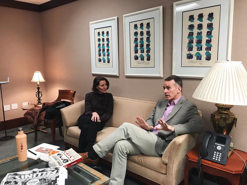 Virginia Prescott and Steve Inskeep chat backstage at the Carter Center before the event.
