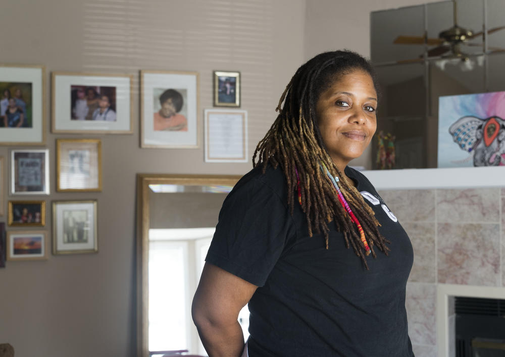 Tyra Ann Tate in the living room of her new house in the northern suburbs of Macon, Ga. 