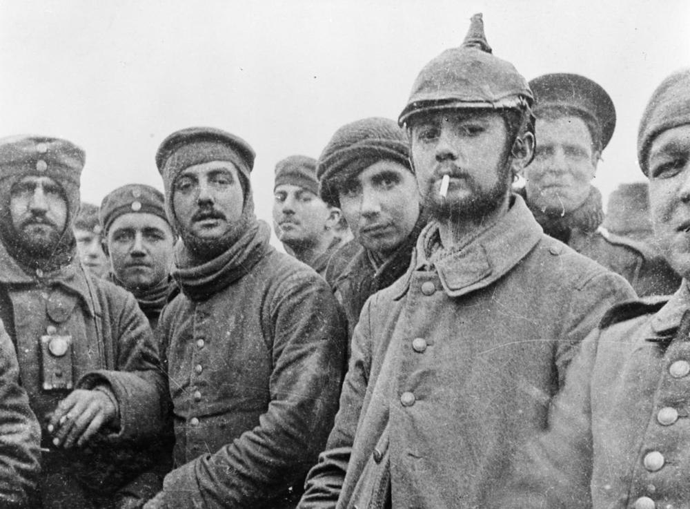 British and German soldiers fraternizing at Ploegsteert, Belgium, on Christmas Day 1914. 