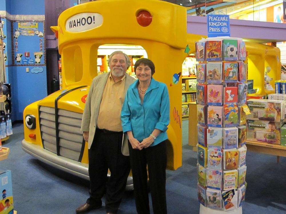 The creators of <em>The Magic School Bus </em>series: illustrator Bruce Degen and author Joanna Cole, posing at the Scholastic Store in New York City in an undated photo.