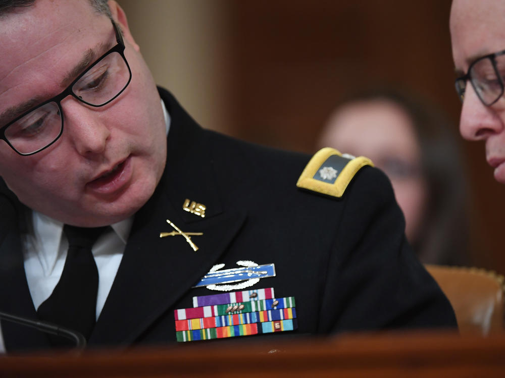 National Security Council Europe expert Lt. Col. Alexander Vindman (left) appears before the House Intelligence Committee during an impeachment hearing in November.