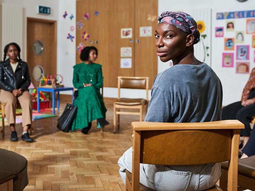 Arabella (Michaela Coel) attends a support meeting with other survivors of sexual assault on HBO's<em> I May Destroy You. </em>Coel, the show's creator, writer, director and star, based the series on a personal experience.