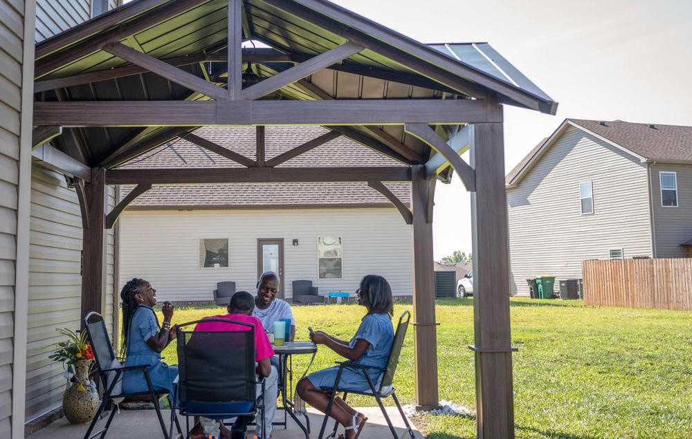 The Latham family plays a game of Uno at their home just outside of Nashville.