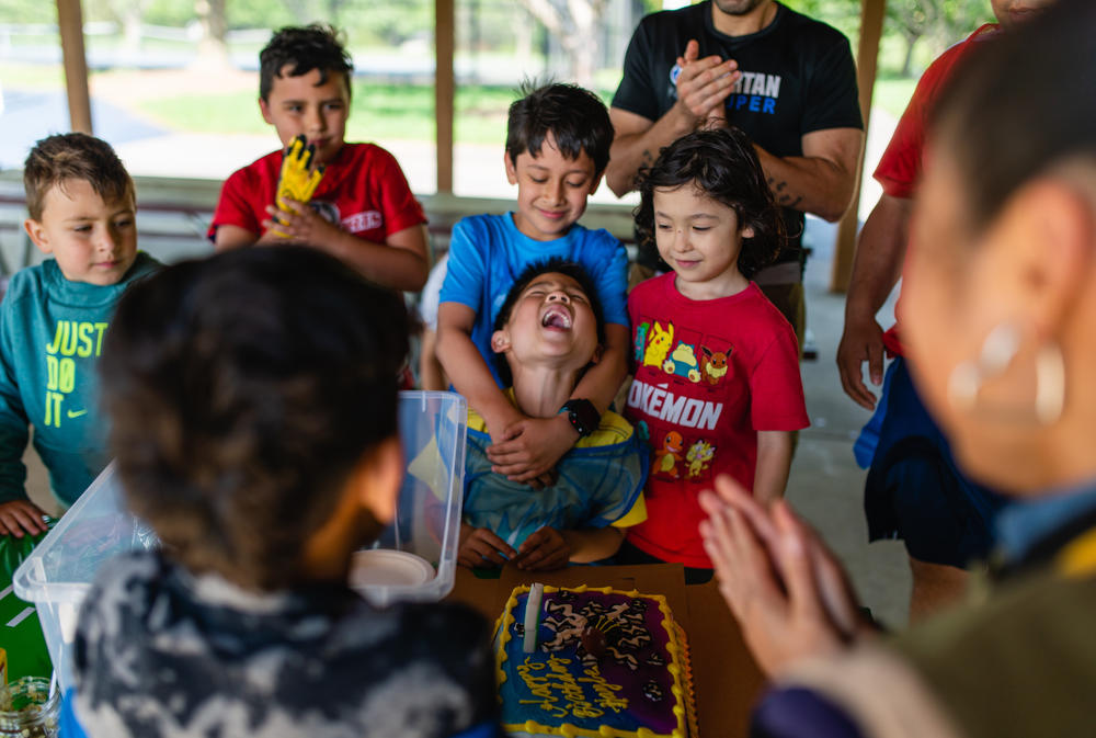 Hayle smiles after blowing out candles at his 7th birthday party on April 28, 2019.