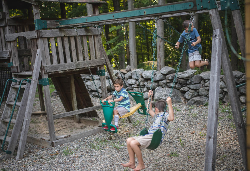 Playing with his brothers, Conner Curran (left) says the gene therapy has really helped him. 
