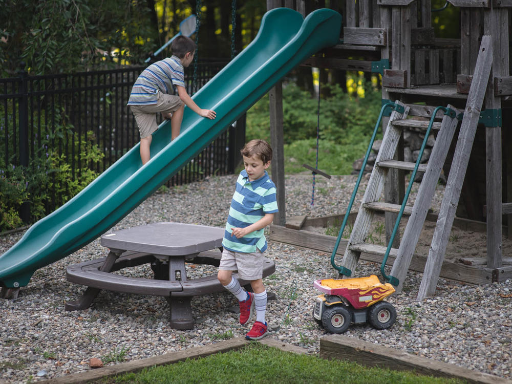 Conner Curran, 9, (right) and his brother Will, 7, at their home in Ridgefield, Conn., this week. The gene therapy treatment that stopped the muscle wasting of Conner's muscular dystrophy two years ago took more than 30 years of research to develop.