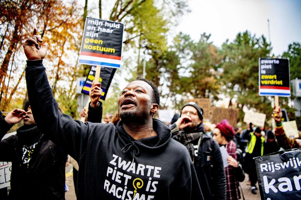 Dutch anti-discrimination activist Jerry Afriyie, leader of the Kick Out Zwarte Piet movement, demonstrates last November in Rijswijk, Netherlands, during the arrival of Sinterklaas and the blackface character who traditionally accompanies him.