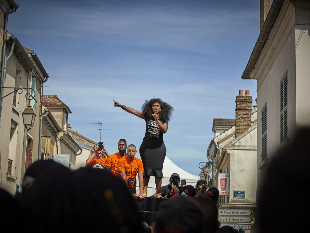 Assa Traoré addresses a crowd during a demonstration in Persan, France, to commemorate the fourth anniversary of her brother Adama Traoré's death. 