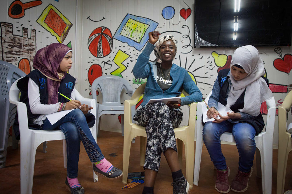 Emi Mahmoud conducts a poetry workshop with children at the community center in the Zaatari refugee camp in Jordan.