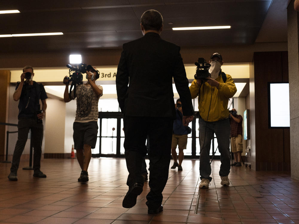 Former Minneapolis Police officer Tou Thao — one of the four ex-officers facing criminal charges in the death of George Floyd — was met by members of the press after a hearing at the Hennepin County Government Center in Minneapolis, at which Judge Peter Cahill lifted a gag order preventing involved parties from speaking publicly about the case.