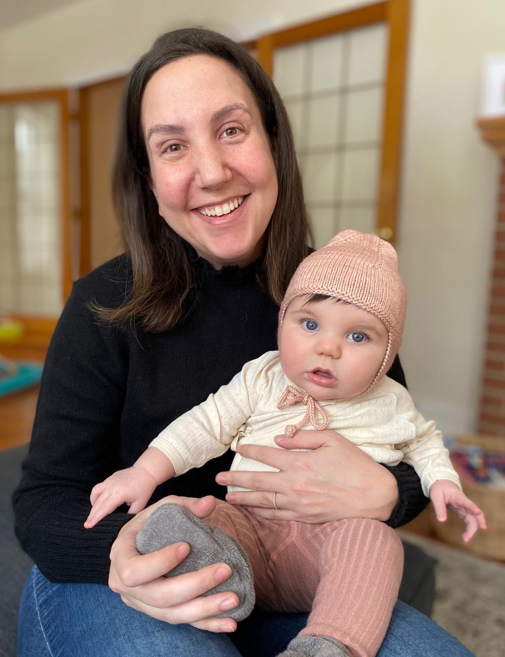 Sheera Talpaz, seen with her daughter Ruby, is buying her first house in Oberlin, Ohio. Low interest rates will make the mortgage payment lower than her previous rent in California, Talpaz says.