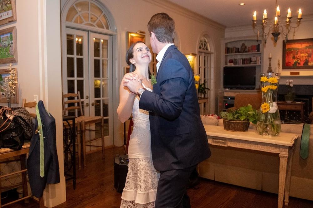 The parents of the groom, Kathryn and Charles Brown, held the wedding reception at their house.