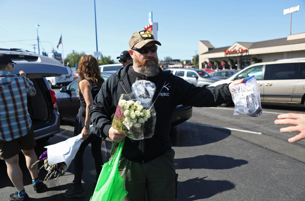Founder Duke Aaron greets members of the Puget Sound John Brown Gun Club. In 2017, van Spronsen was the club's first recruit.