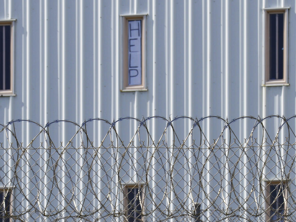 Holman Correctional Facility is one of the Alabama prisons that the Justice Department alleges inmates are subjected to excessive force by prison staff. This photo, taken in 2019, shows a sign that reads, 