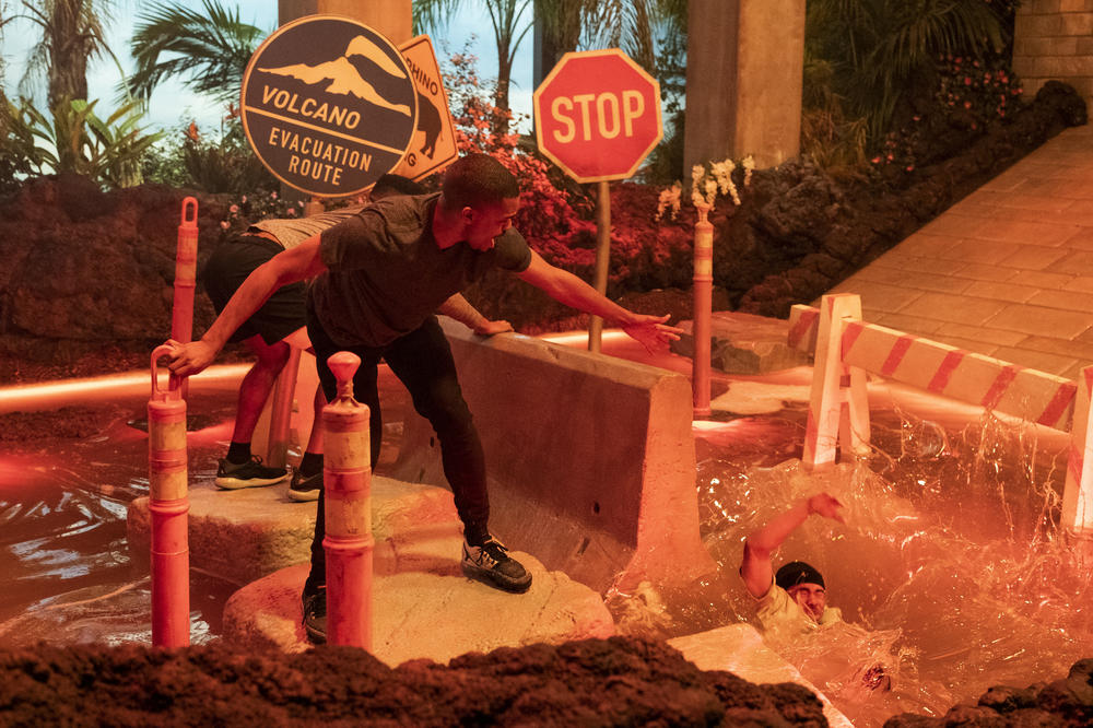 Contestants compete to win $10,000 — and a lava lamp — on <em>Floor Is Lava.</em>