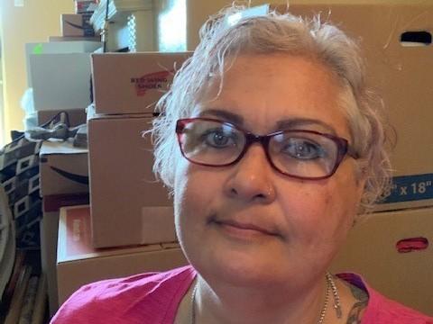 Merry Collins has been fighting COVID-19 and the threat of eviction at the same time. She's been boxing up her belongings in her Dallas apartment and worries she could be evicted soon. 