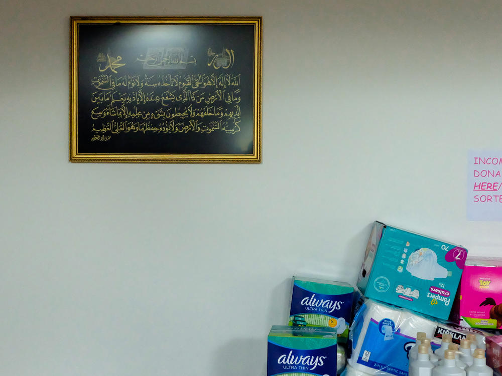 Supplies and essential items are stacked in the prayer area of the mosque. The prayer area was converted into a distribution area delivering essential supplies to families in the community, after the mosque closed due to the COVID-19 pandemic, and it has increased distribution since the recent uprisings following the killing of George Floyd.