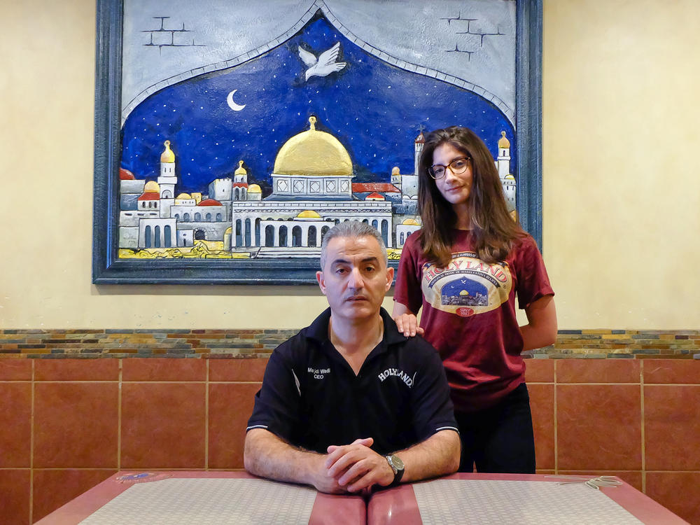 Holy Land owner Majdi Wadi (left) with his daughter Noor Wadi (right) at the Northeast location of the family business.
