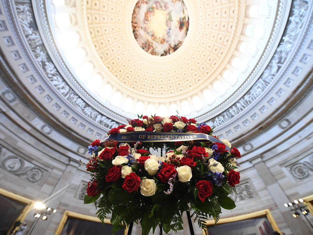 A wreath is shown before the start of a memorial service Monday for Lewis in the Capitol Rotunda.