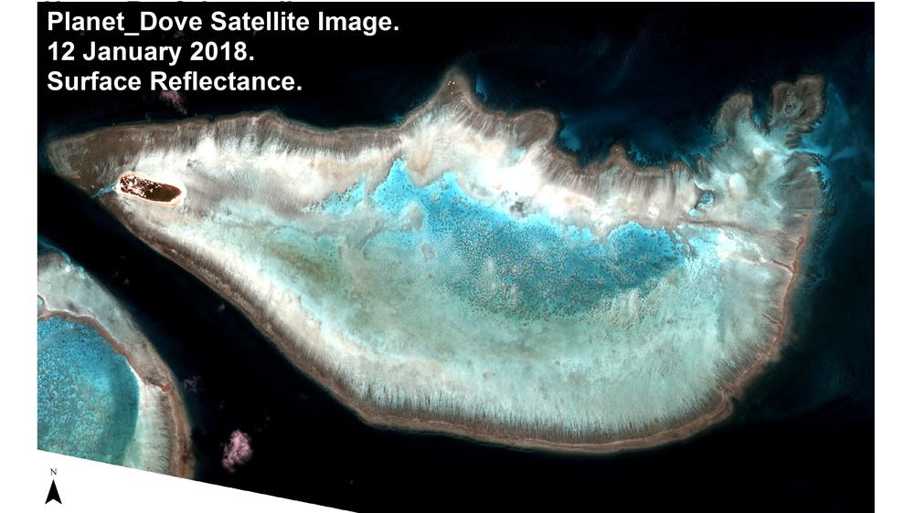 A satellite image shows the reef off Australia's Heron Island. Vulcan is using satellite images to map all of the world's tropical, shallow-water reefs. The project is set to be completed by the middle of 2021.