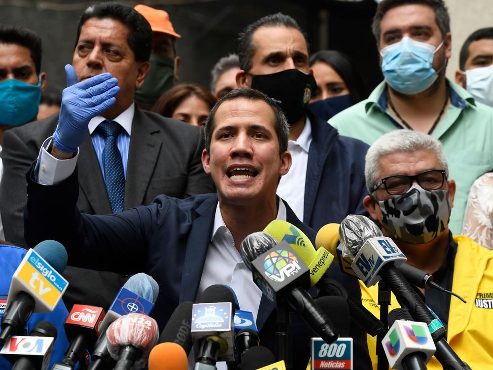 Venezuelan opposition leader and self-proclaimed acting president Juan Guaidó delivers a press conference at Democratic Action party headquarters in Caracas on June 17.