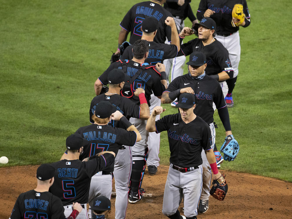 The Miami Marlins celebrate their Opening Day win against the Philadelphia Phillies last week at Citizens Bank Park in Philadelphia.